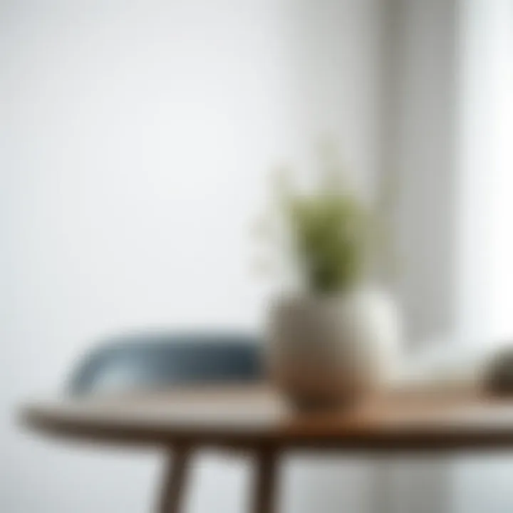 Minimalistic Ceramic Pot with Greenery Minimalistic ceramic pot with greenery on a table